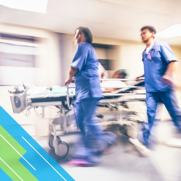 two medical staff are taking a patient for emergency care